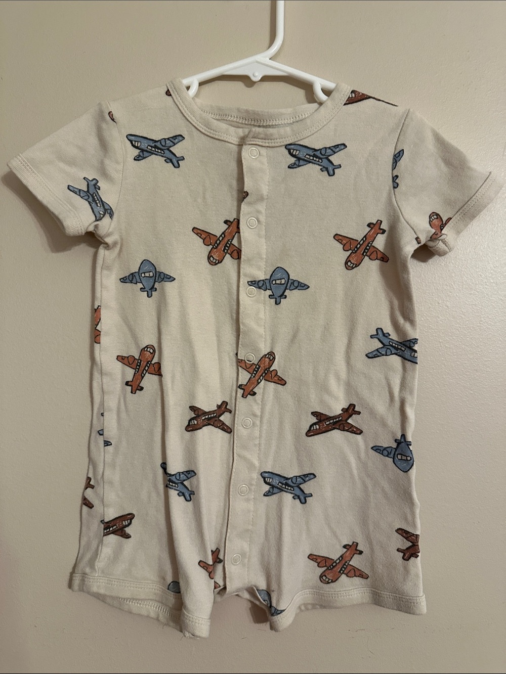 Carter's Cream Sleeveless button up Romper with Brown and Blue Dinosaur Print